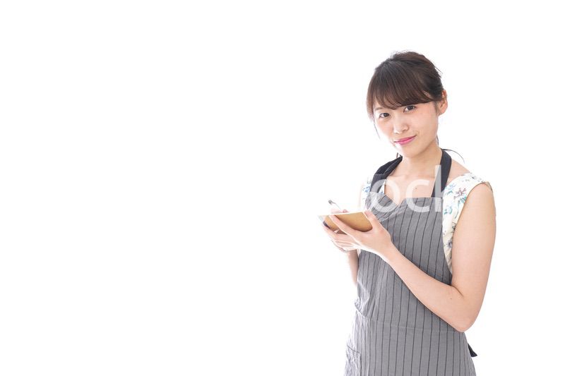 注文を取るカフェスタッフ