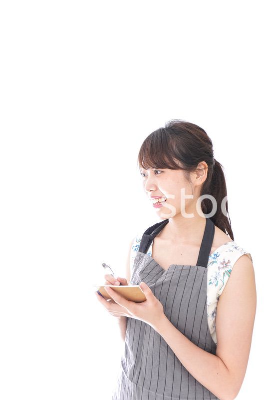 注文を取るカフェスタッフ