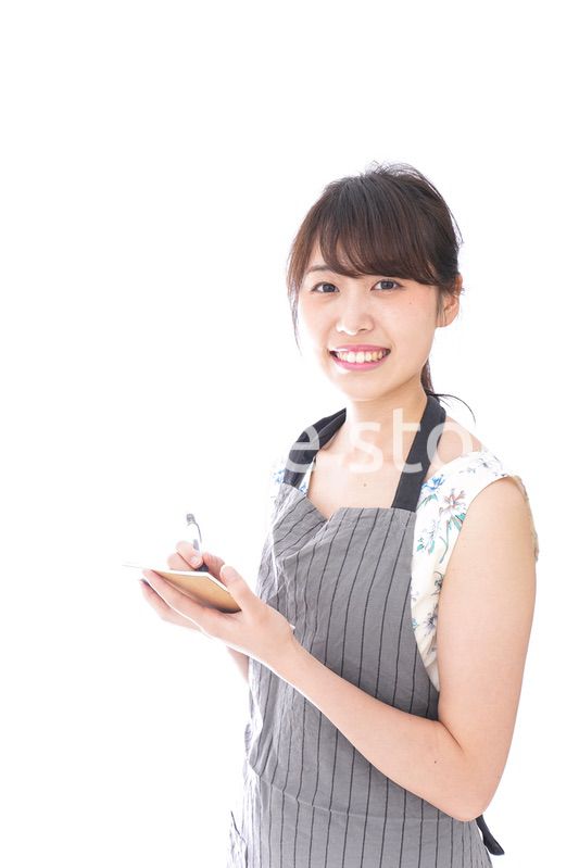 注文を取るカフェスタッフ