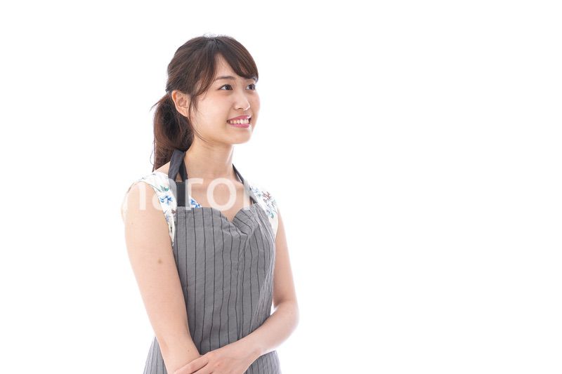 おじぎをするカフェの店員・おもてなし