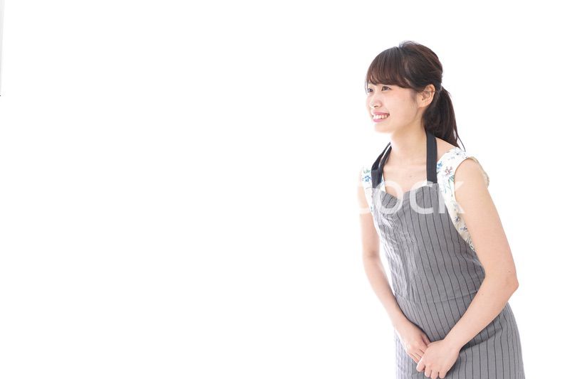 おじぎをするカフェの店員・おもてなし