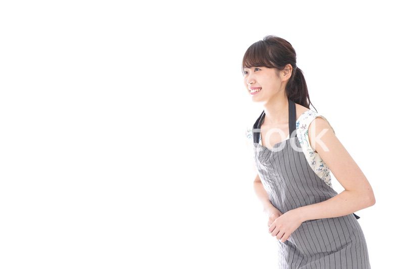 おじぎをするカフェの店員・おもてなし