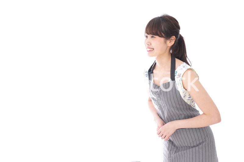 おじぎをするカフェの店員・おもてなし