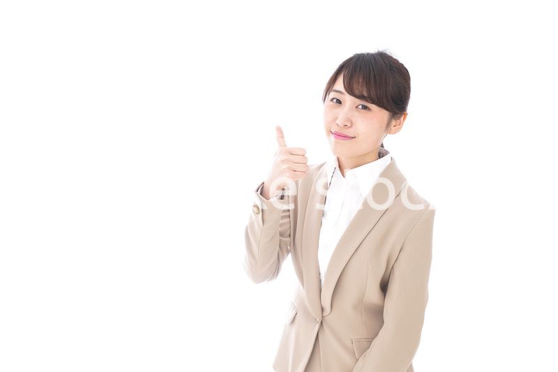 グッドサインをするビジネスウーマン