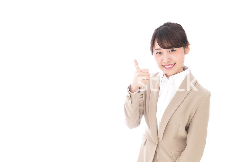グッドサインをするビジネスウーマン