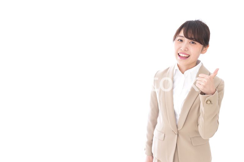 グッドサインをするビジネスウーマン