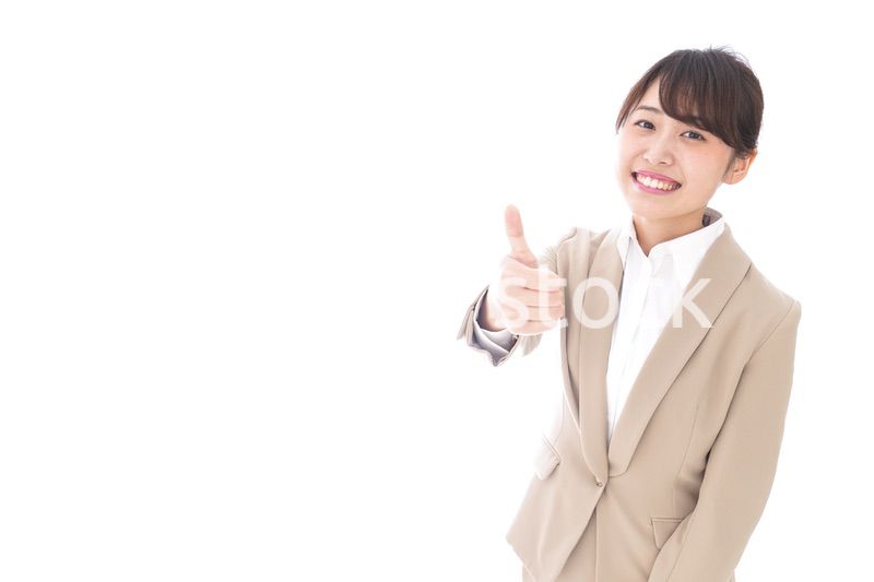 グッドサインをするビジネスウーマン