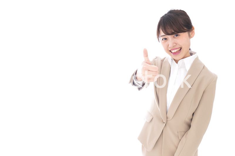 グッドサインをするビジネスウーマン