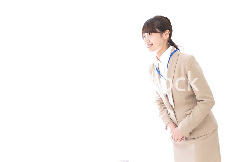 おじぎをするビジネスウーマン