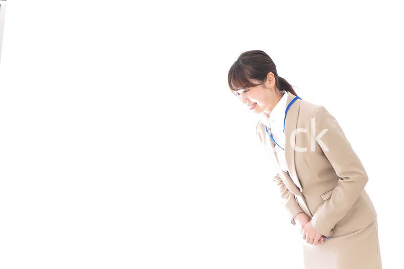 おじぎをするビジネスウーマン