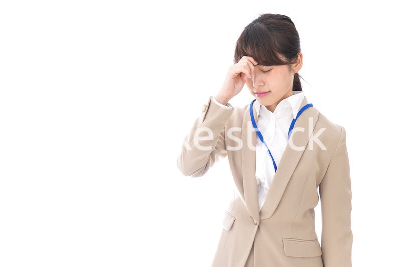ビジネスウーマン・頭痛
