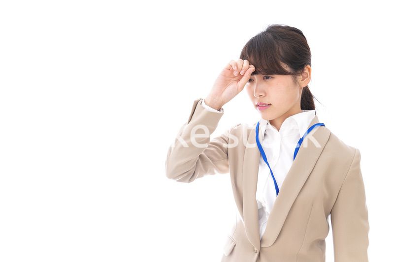 ビジネスウーマン・頭痛