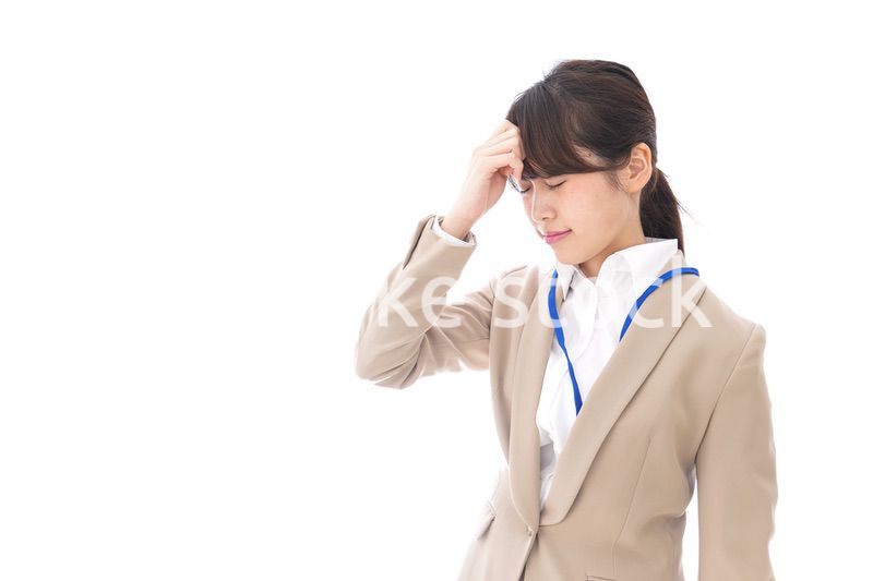 ビジネスウーマン・頭痛