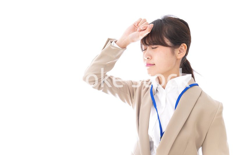 ビジネスウーマン・頭痛