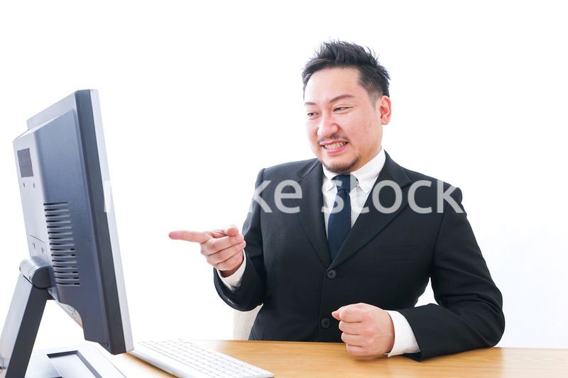 怒るビジネスパーソン