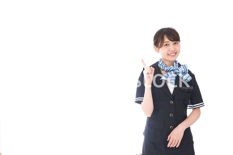 アドバイスをするキャビンアテンダント