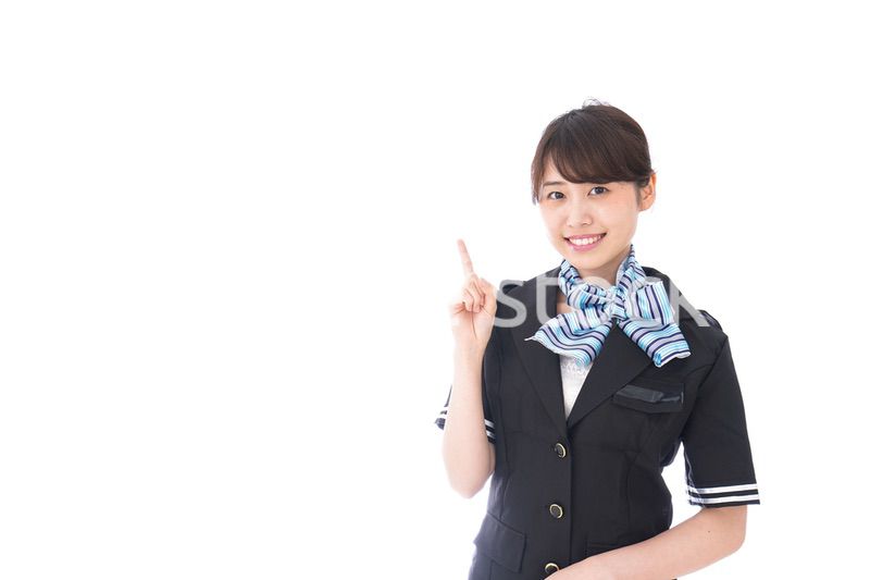 アドバイスをするキャビンアテンダント