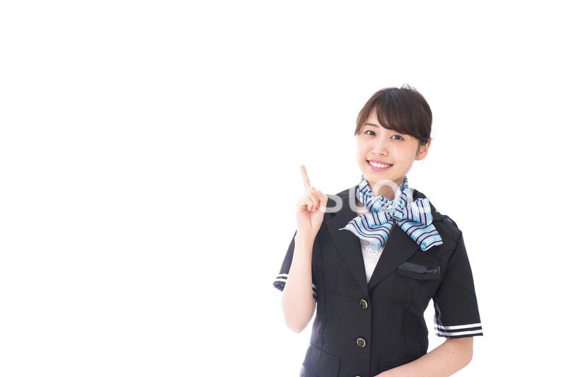 アドバイスをするキャビンアテンダント