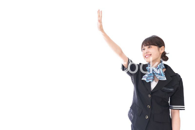 お見送りをするキャビンアテンダント