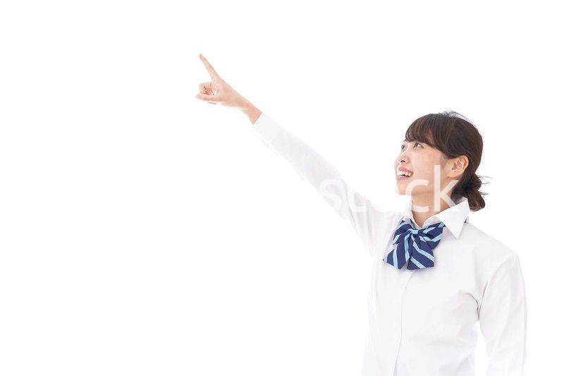 未来を指差す若い学生