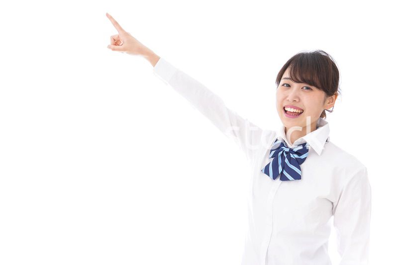 未来を指差す若い学生