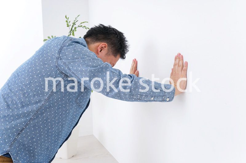 体調不良の男性