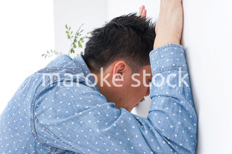 体調不良の男性