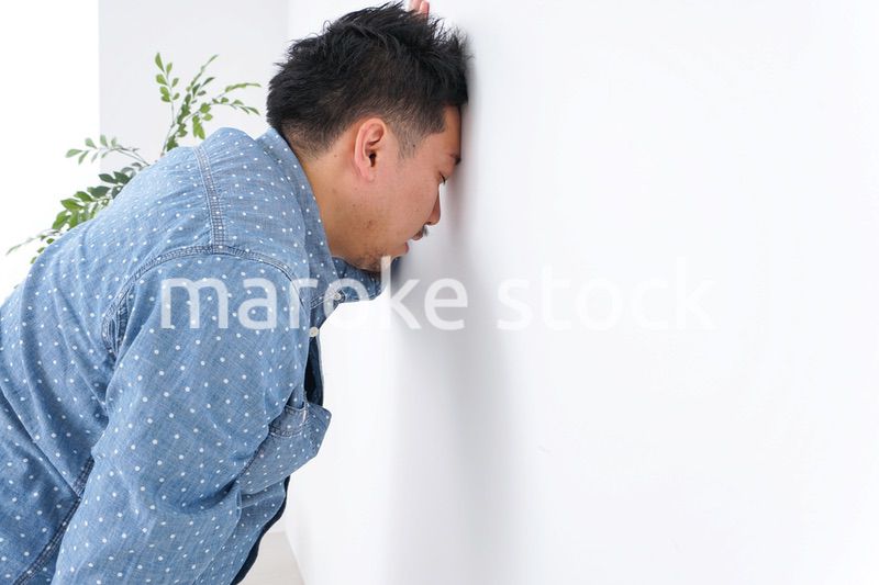 体調不良の男性