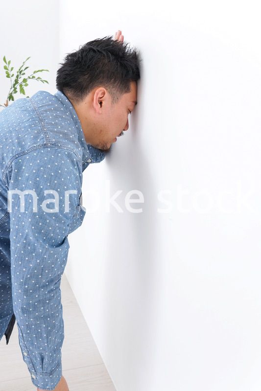 体調不良の男性