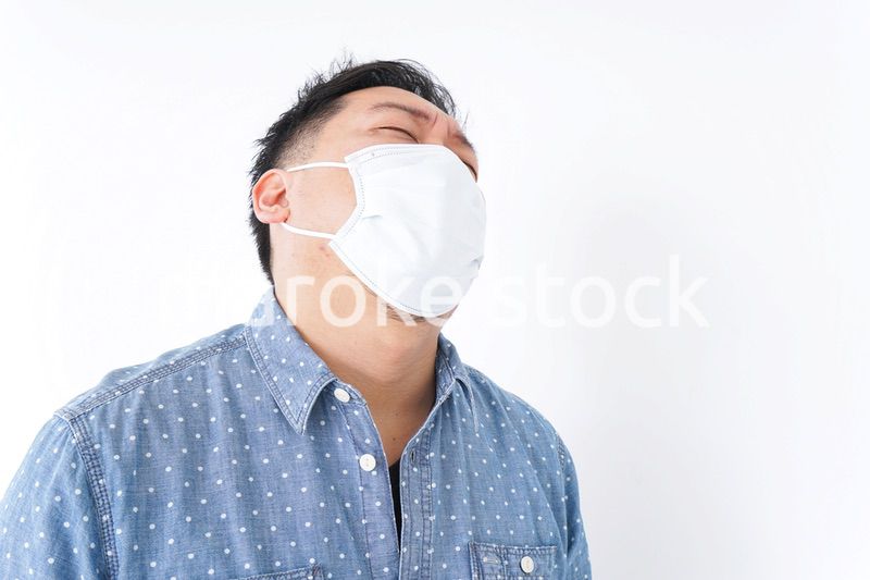 体調不良の男性