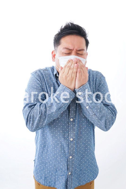 体調不良の男性