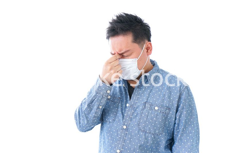 風邪をひいた男性