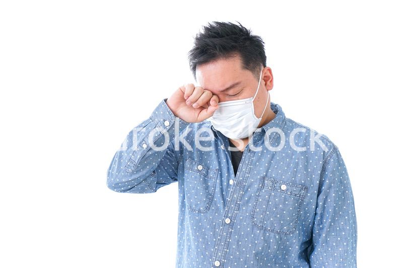 風邪をひいた男性