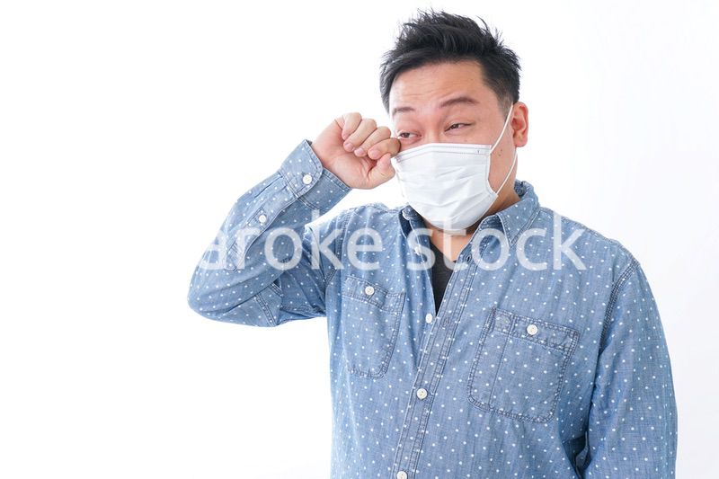 体調不良の男性