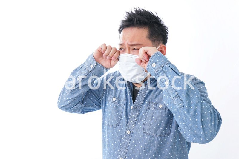 体調不良の男性