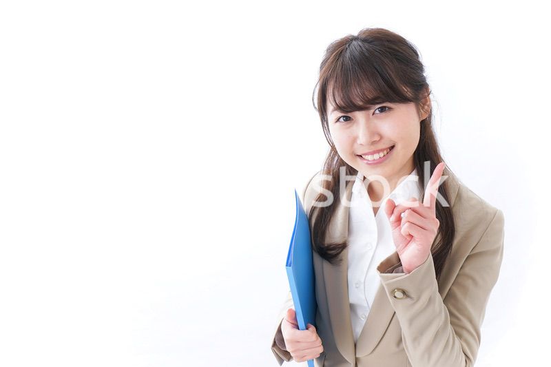 指をさすビジネスウーマン