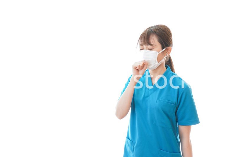 感染症にかかり体調不良に苦しむ医療従事者