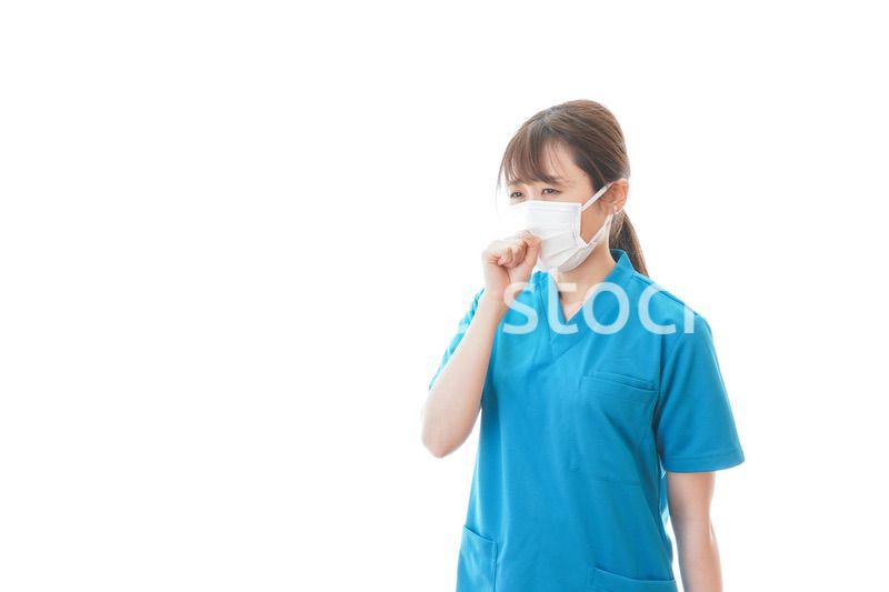 感染症にかかり体調不良に苦しむ医療従事者