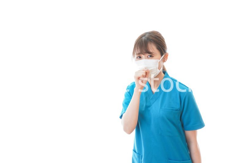 感染症にかかり体調不良に苦しむ医療従事者