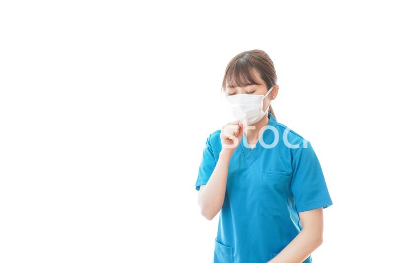 感染症にかかり体調不良に苦しむ医療従事者