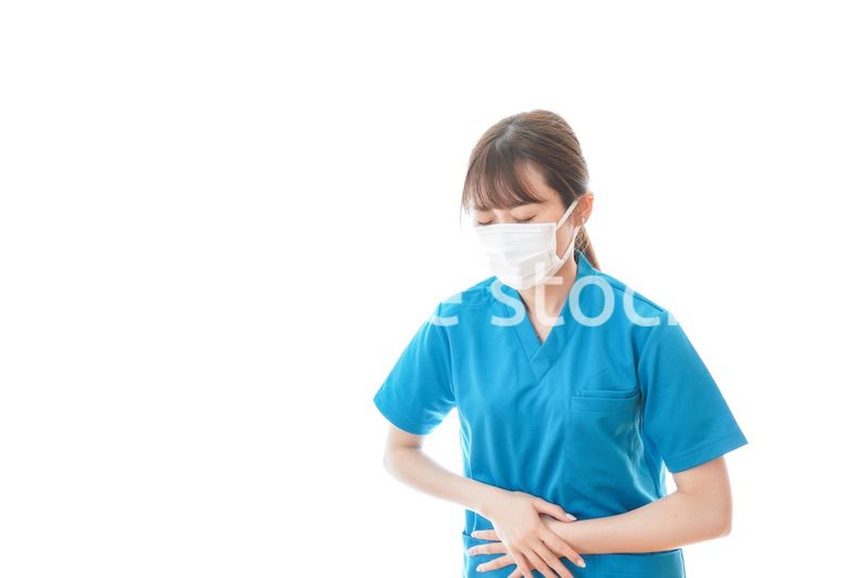 感染症にかかり体調不良に苦しむ医療従事者