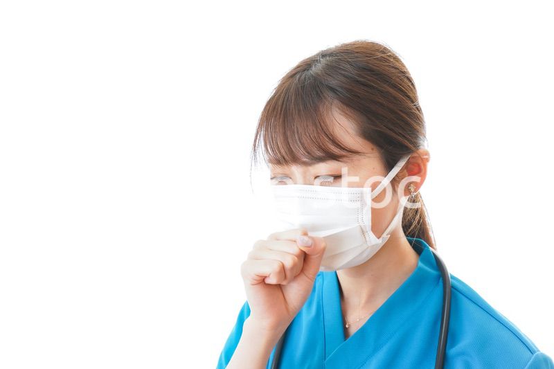 感染症にかかり体調不良に苦しむ医療従事者