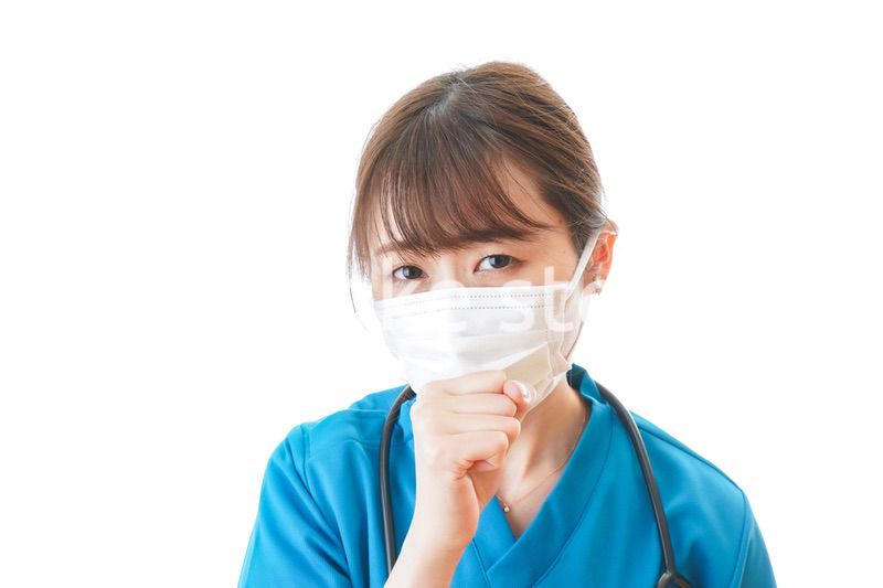 感染症にかかり体調不良に苦しむ医療従事者