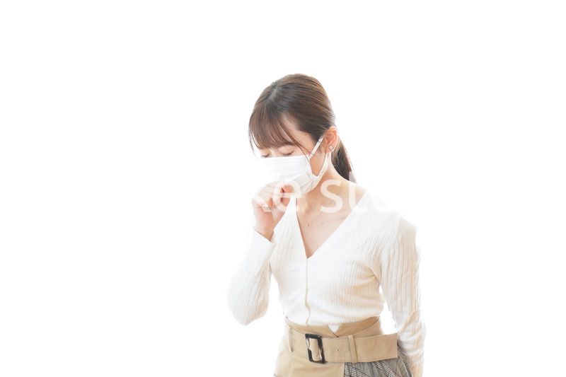 肺炎に感染した若いビジネスウーマン