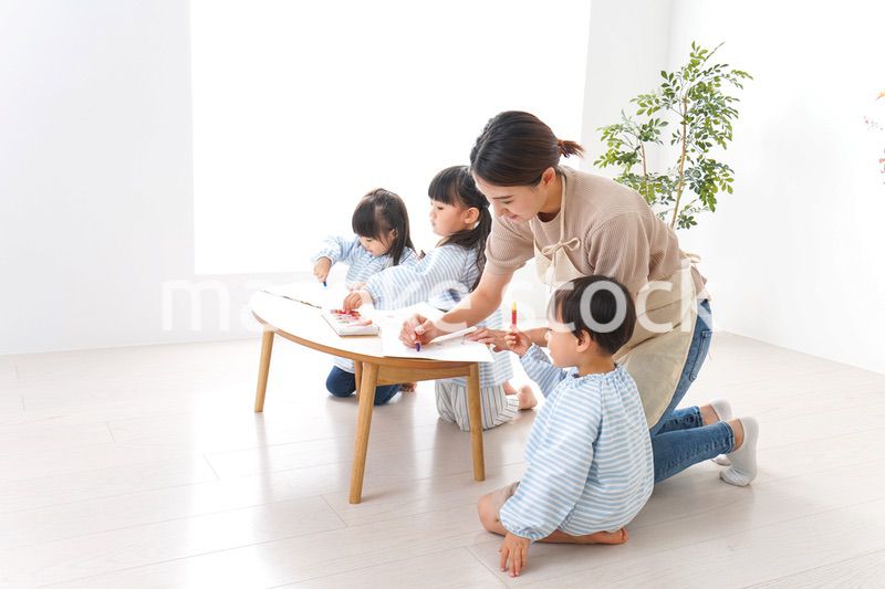 Children and teacher at kindergarten
