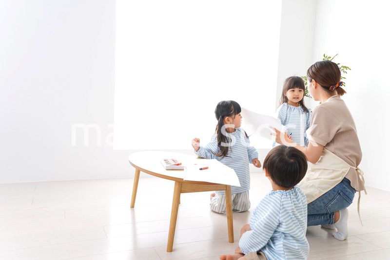 Children and teacher at kindergarten