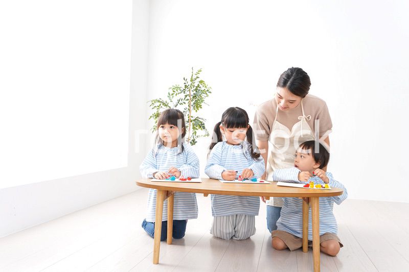 Children and teacher at kindergarten