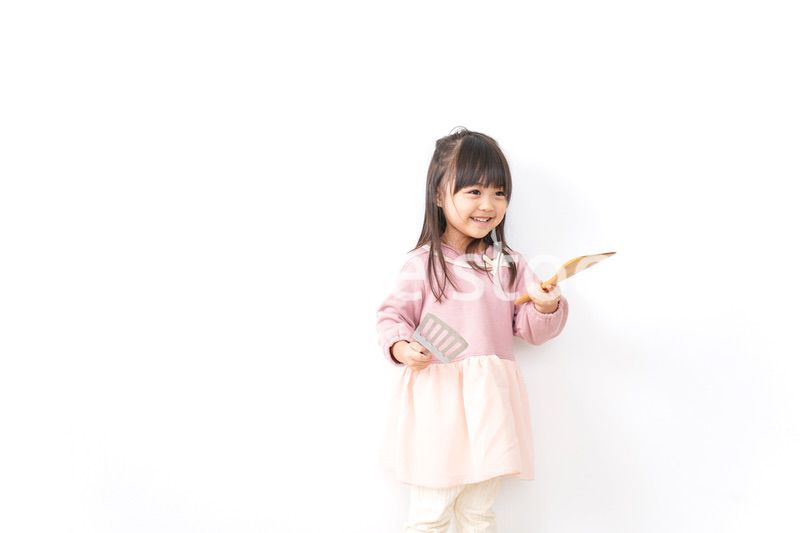 料理をする子供