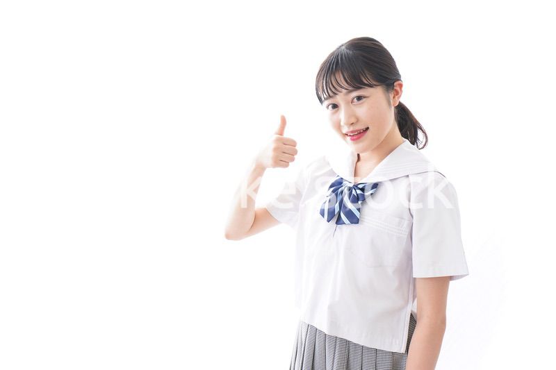 OKサインをする学生