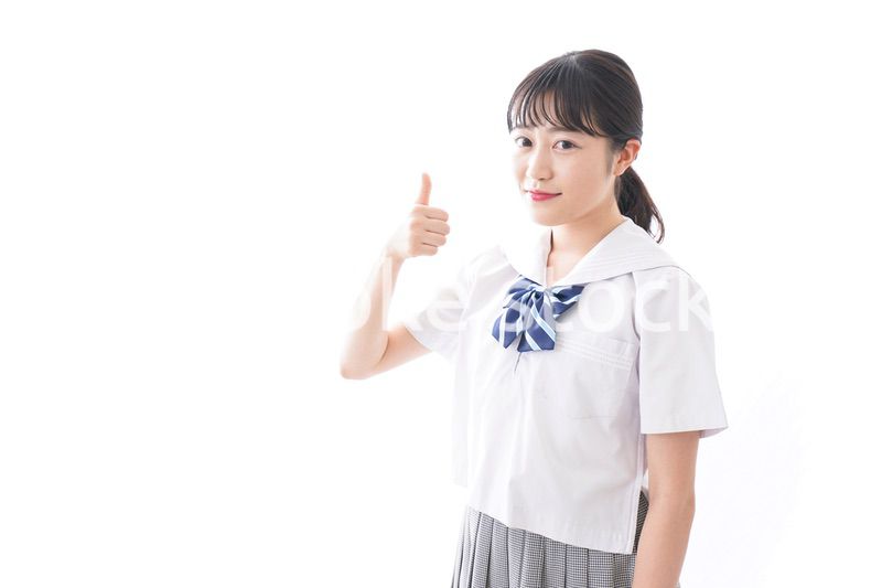 OKサインをする学生